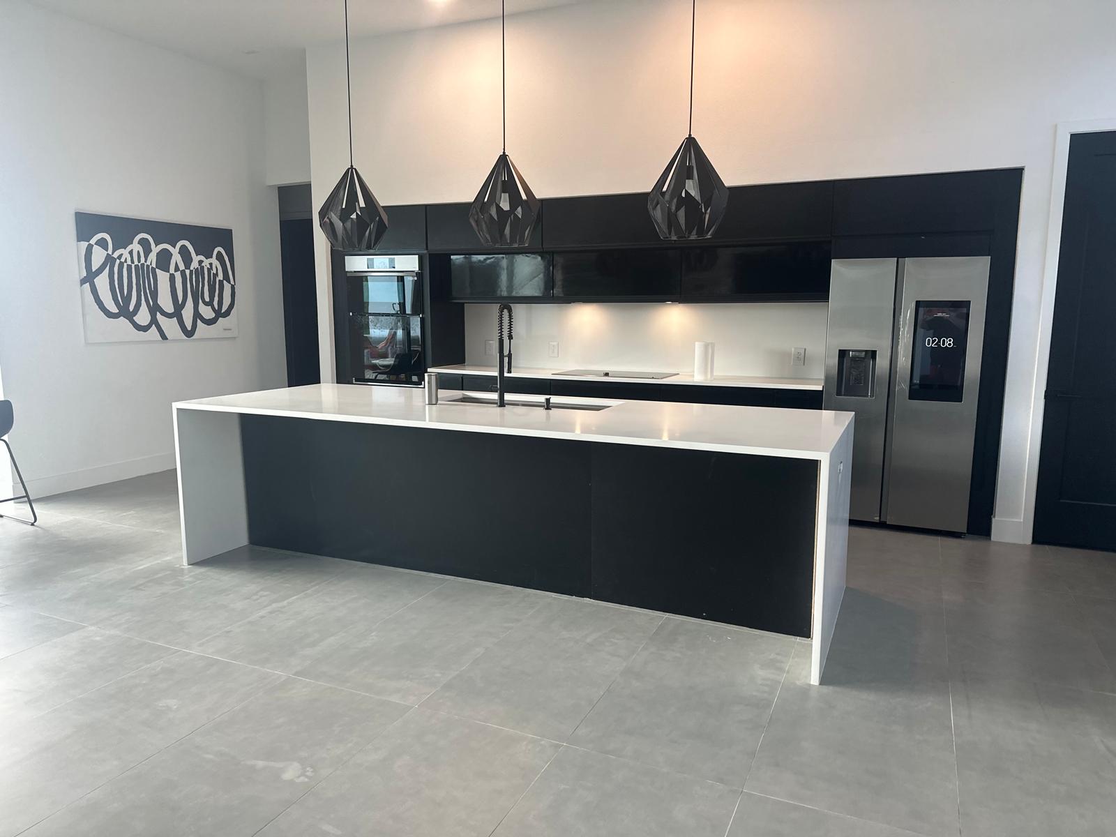 The Sassatelli modern waterfall-island kitchen